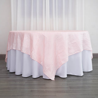 Elevate Your Wedding Decor with the Blush Accordion Crinkle Taffeta Square Table Overlay