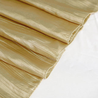 Create a Memorable Event with the Gold Accordion Crinkle Taffeta Square Table Overlay