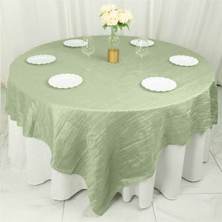 Create a Timeless and Enchanting Atmosphere with the Sage Green Accordion Crinkle Taffeta Square Table Overlay