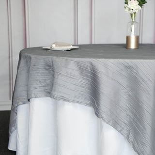 Enhance Your Event Decor with the Silver Accordion Crinkle Taffeta Table Overlay