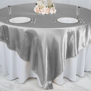 Create a Luxurious Setting with Silver Satin Table Decor