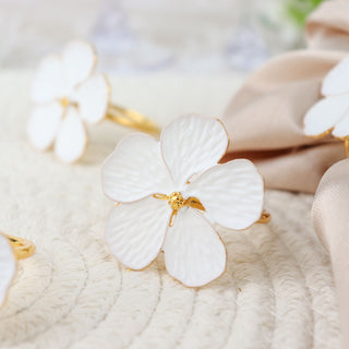 Elevate Your Table with White and Gold Metal Flower Napkin Rings