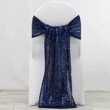 Navy sequin chair sash draped elegantly over a white chair