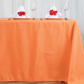 Add a Pop of Color to Your Event with the Orange Polyester Tablecloth