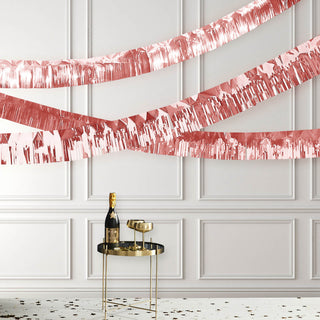 Add a Pop of Peppy Excitement with the Metallic Rose Gold Foil Tassel Fringe Backdrop Banner