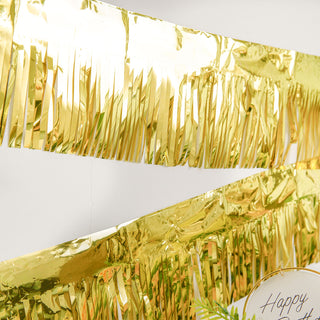 Create a Festive and Memorable Ambiance with the Metallic Gold Foil Tassel Fringe Backdrop Banner