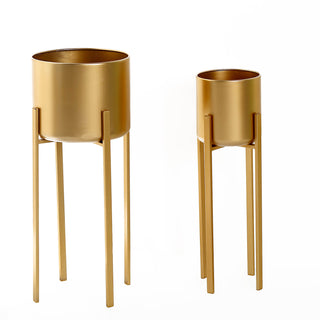 Create a Magical Ambiance with Gold Metal Planter Stands