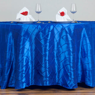 Elevate Your Event Decor with the Royal Blue Pintuck Round Seamless Tablecloth