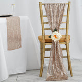 Gold sequin chair sash with flower accent on a chiavari chair.