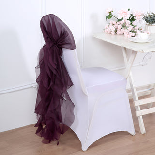 Event Decor Elevated with Eggplant Chiffon Hoods and Willow Chair Sashes