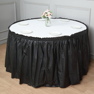 Enhance Your Event Decor with the Black Disposable Table Skirt