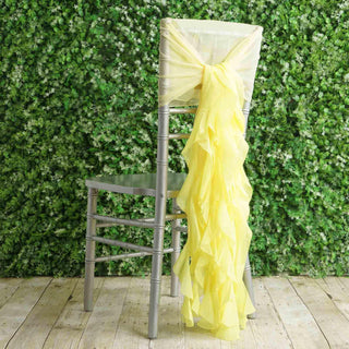 Elevate Your Event Decor with Yellow Chiffon Hoods and Ruffled Willow Chair Sashes