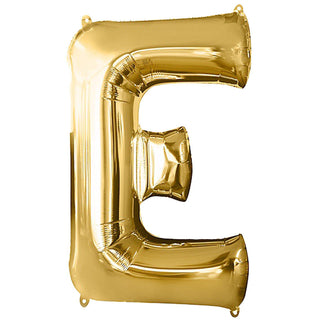 Gold foil balloon letter "E" on a plain background.