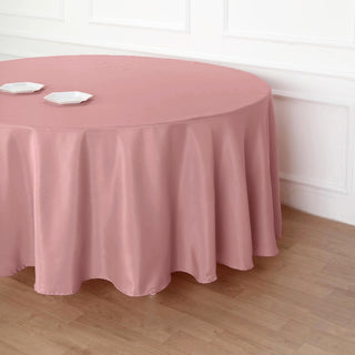 Create an Elegant Atmosphere with the Dusty Rose 108" Seamless Polyester Round Tablecloth