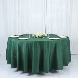 Add Elegance to Your Event with the 108" Hunter Emerald Green Seamless Polyester Round Tablecloth