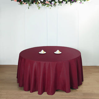 Add Elegance to Your Events with the Burgundy Seamless Polyester Round Tablecloth