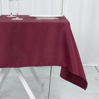 Enhance Your Event with the Burgundy Seamless Premium Polyester Square Table Overlay