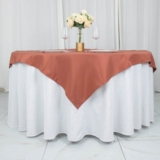 Add Elegance to Your Table with the Terracotta (Rust) Square Polyester Table Overlay