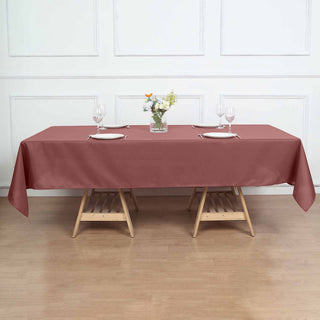 Add Elegance to Your Event with the 60x102 Cinnamon Rose Seamless Polyester Rectangular Tablecloth