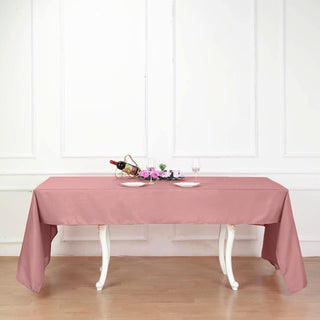 Elevate Your Event with the 60x126 Dusty Rose Seamless Polyester Rectangular Tablecloth