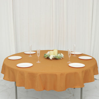 Create a Memorable Event with the 70" Round Gold Seamless Polyester Linen Tablecloth