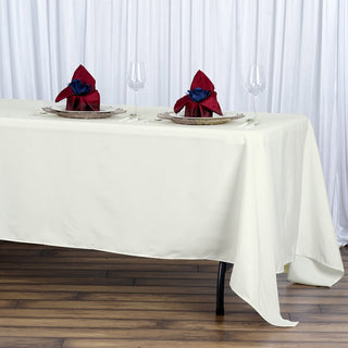 Experience Luxury with the Ivory Seamless Premium Polyester Rectangular Tablecloth