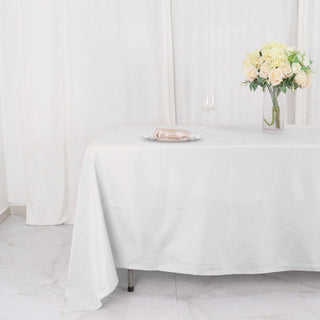 Create a Chic and Sophisticated Ambiance with a White Seamless Polyester Tablecloth