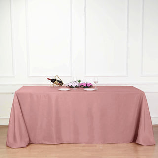 Elevate Your Event Decor with the 90x132 Dusty Rose Seamless Polyester Rectangular Tablecloth