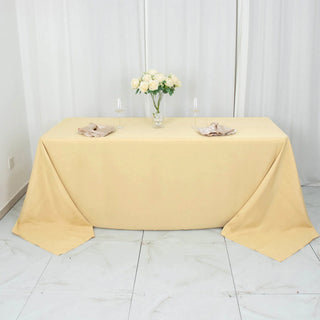 Add Elegance to Your Event with the 90x132 Champagne Tablecloth