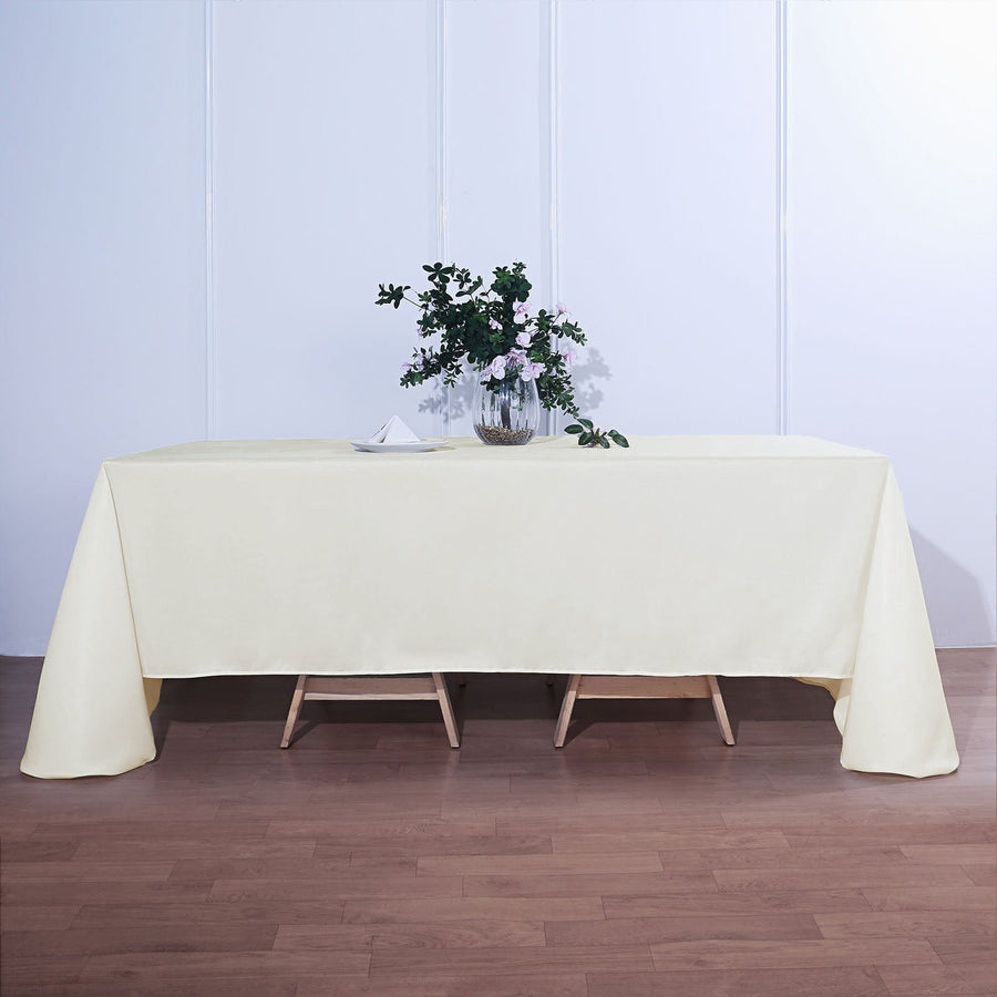 90"x132" Ivory Polyester Rectangular Tablecloth