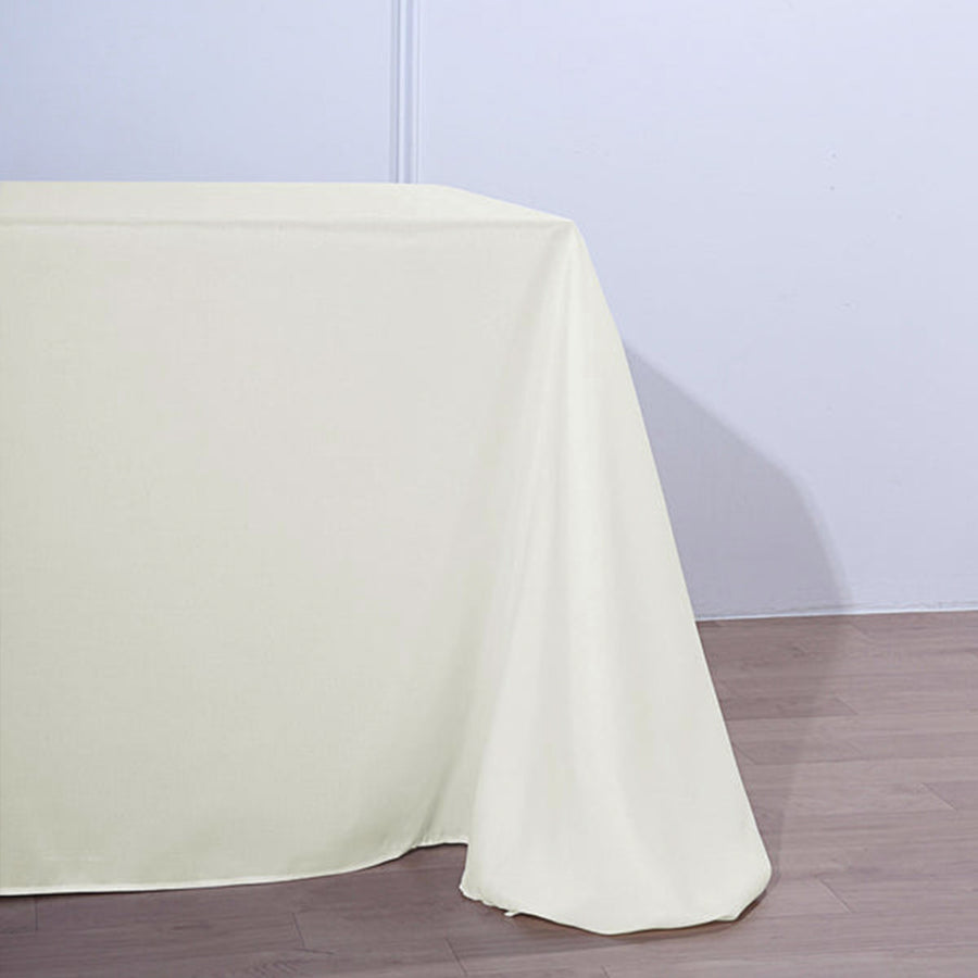 90 Inch x 156 Inch | Ivory Polyester Rectangular Tablecloth | TableclothsFactory