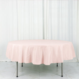 Add Elegance to Your Event with the 90" Blush Seamless Polyester Round Tablecloth