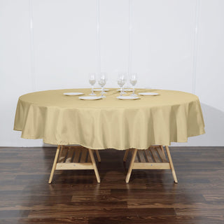 Elevate Your Event with the 90" Champagne Seamless Polyester Round Tablecloth