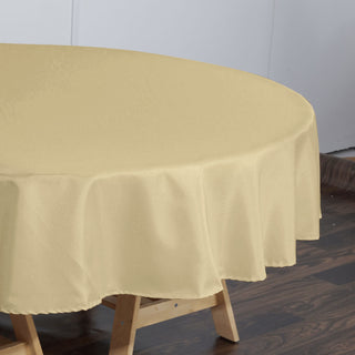 Make a Statement with the Champagne Round Tablecloth