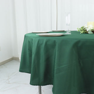 Unleash Your Creativity with the 90" Hunter Emerald Green Seamless Polyester Round Tablecloth
