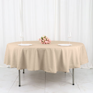 Elevate Your Event Decor with the 90" Nude Seamless Polyester Round Tablecloth
