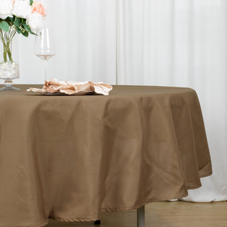 Create an Upscale Atmosphere with the 90" Taupe Seamless Polyester Round Tablecloth