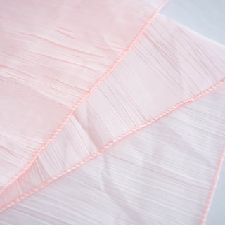 Create an Unforgettable Event with the 120" Blush Seamless Accordion Crinkle Taffeta Round Tablecloth