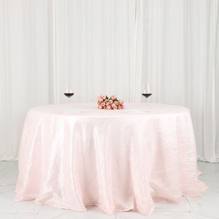Create an Imperial Sublimity with the 132" Blush Accordion Crinkle Taffeta Seamless Round Tablecloth