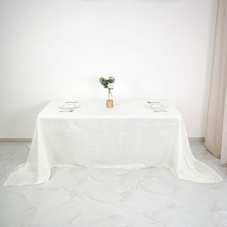 Elevate Your Event with the Ivory Accordion Crinkle Taffeta Tablecloth