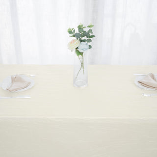Enhance Your Event Decor with the Ivory Accordion Crinkle Taffeta Tablecloth