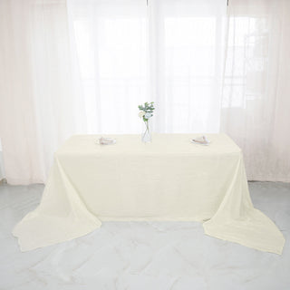 Elevate Your Event with the Ivory Accordion Crinkle Taffeta Tablecloth