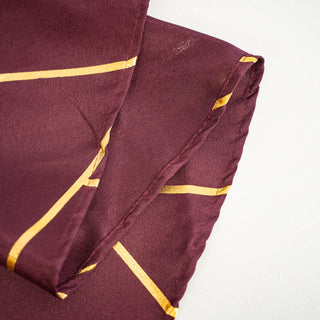 Create a Captivating Table Setting with Burgundy and Gold