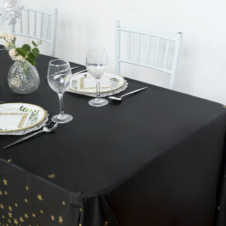 Elevate Your Event Decor with the Black Gold Stars Tablecloth