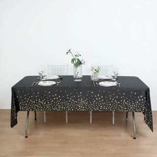 Add Elegance to Your Event with the Black Gold Stars Tablecloth