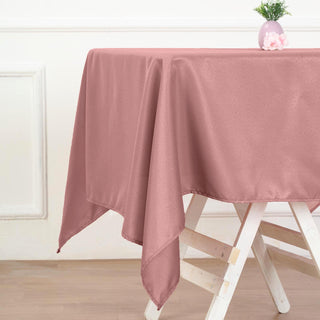 Enhance Your Event Decor with the Dusty Rose Square Seamless Polyester Table Overlay