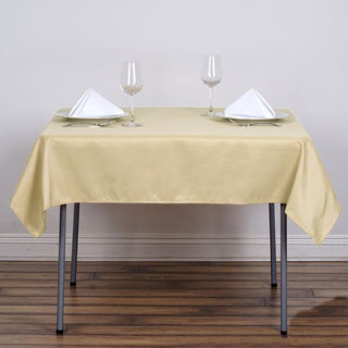 Elevate Your Event with the 54"x54" Champagne Square Seamless Polyester Tablecloth