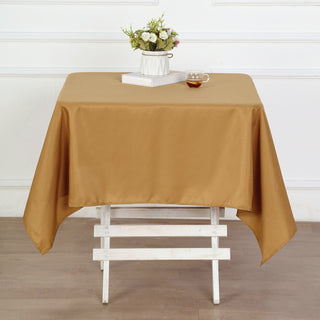 Add Elegance to Your Event with the 54x54 Gold Square Polyester Tablecloth