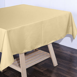 Create a Stylish and Memorable Event with the 70x70 Champagne Square Seamless Polyester Tablecloth