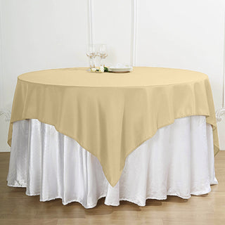 Create a Luxurious Ambiance with the 70"x70" Champagne Square Seamless Polyester Table Overlay